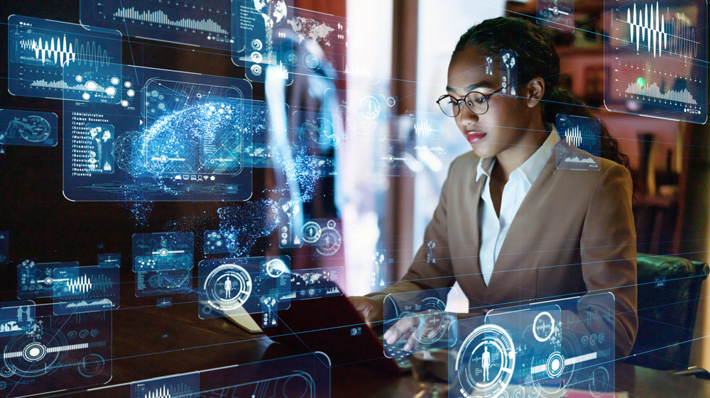 DIO STEM graduate in engineering working on a computer