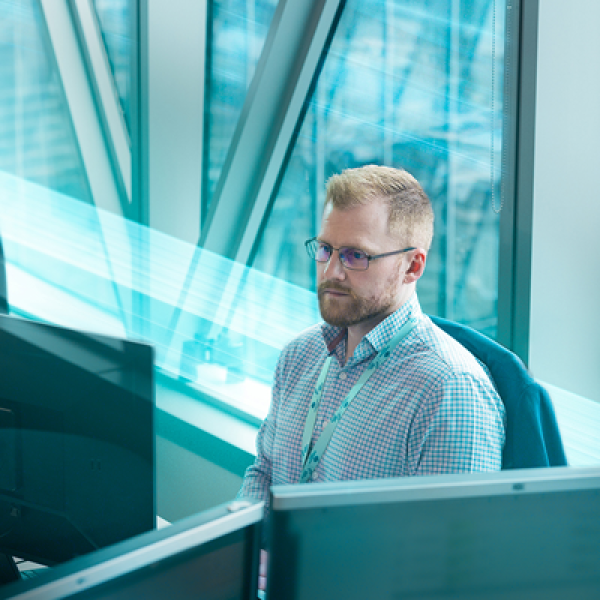 Professionals on computers